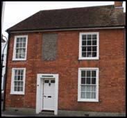 Double fronted brick or flint faced